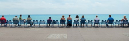 People gaze out to the calm waters of the Med, the day before Ironman Nice 2014.