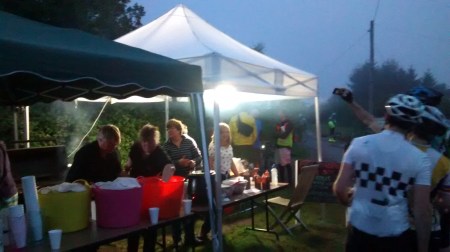 Volunteers feed hungry and thirsty cyclists. Thank you!